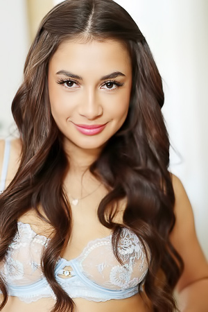 Sultry Brunette Vanessa Teases in Delicate Lingerie