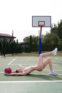 Sporty Girl Guinevere Huney Playing Basketball
